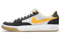 Nike SB Adversary University Gold logo